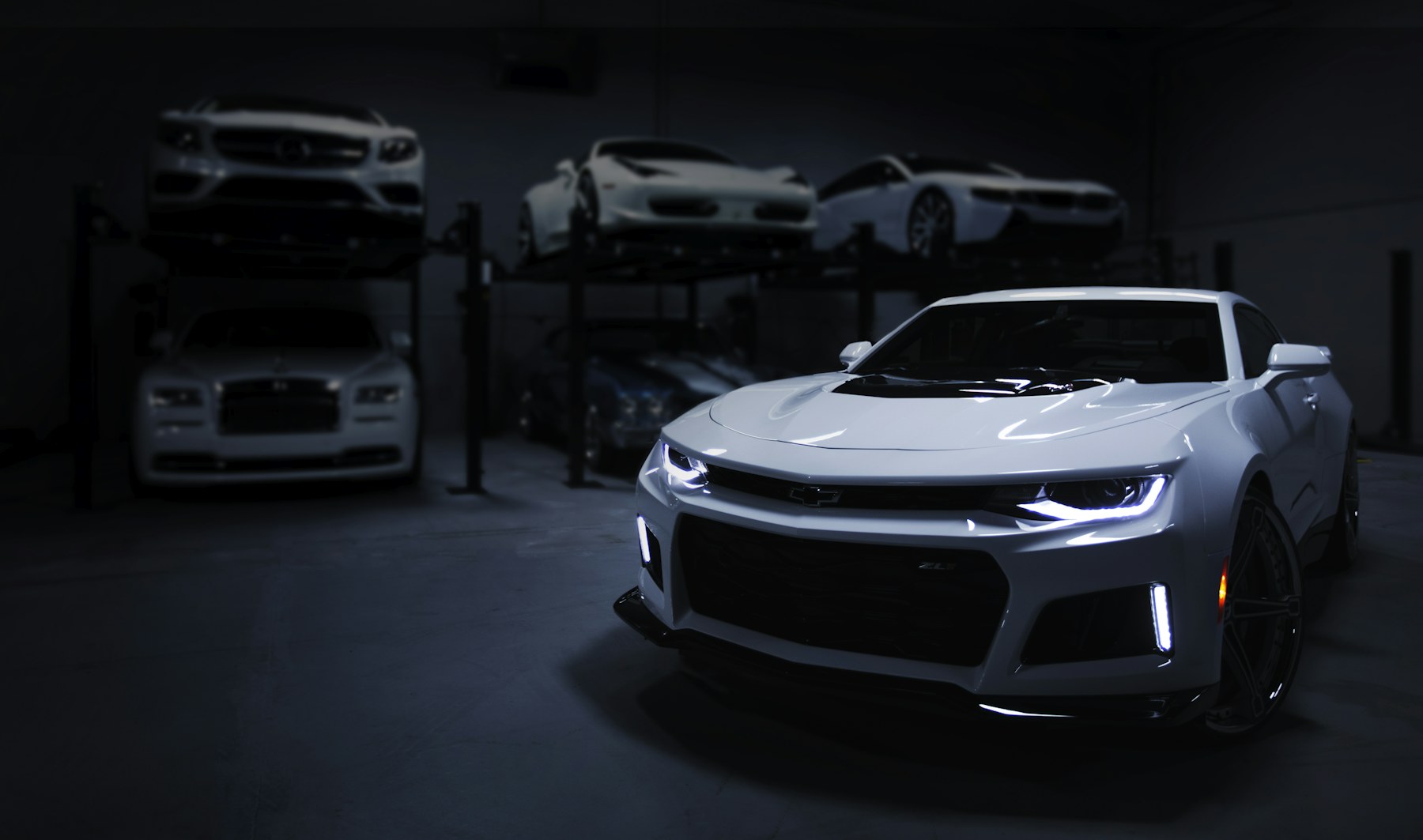 Modern silver sports car in a studio